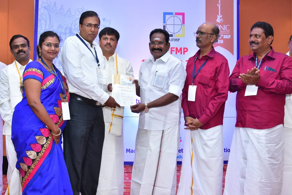 Award presentation at an AIFMP ceremony