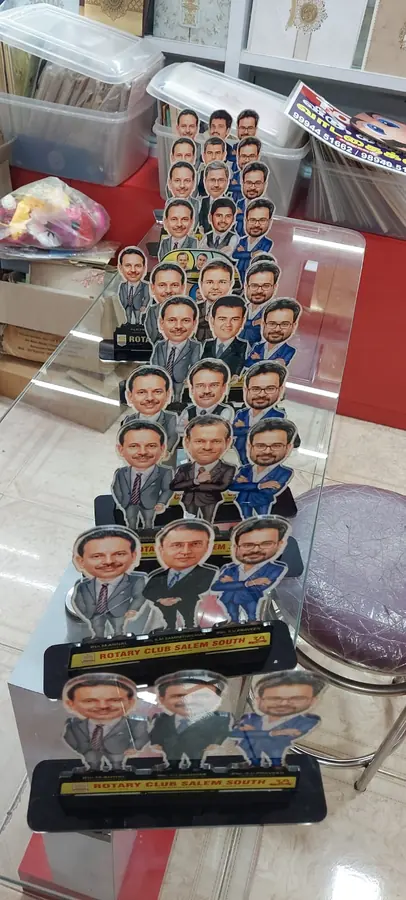 Caricature standees on a table