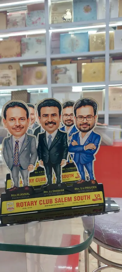 Caricature standee of three men